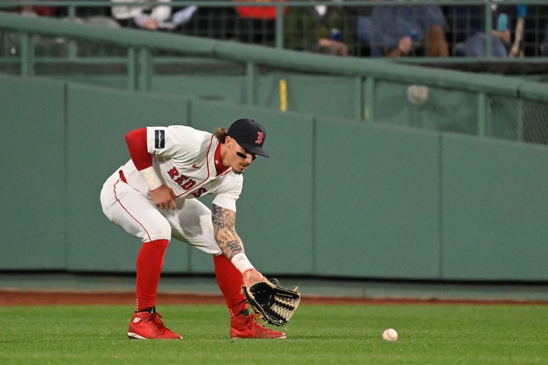 May 16, 2024; Boston, Massachusetts, USA;  Boston Red Sox center fielder Jarren Duran (16) catches a ground ball during the fifth inning against the Tampa Bay Rays at Fenway Park. Mandatory Credit: Eric Canha-USA TODAY Sports