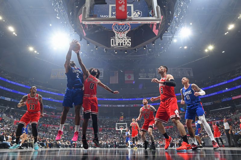 LOS ANGELES, CA - MARCH 9: Coby White #0 of the Chicago Bulls grabs a rebound during the game against the LA Clippers on March 9, 2024 at Crypto.Com Arena in Los Angeles, California. NOTE TO USER: User expressly acknowledges and agrees that, by downloading and/or using this Photograph, user is consenting to the terms and conditions of the Getty Images License Agreement. Mandatory Copyright Notice: Copyright 2024 NBAE (Photo by Adam Pantozzi/NBAE via Getty Images)