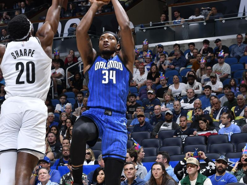 ORLANDO, FL - FEBRUARY 27: Wendell Carter Jr. #34 of the Orlando Magic shoots the ball during the game against the Brooklyn Nets on February 27, 2024 at the Kia Center in Orlando, Florida. NOTE TO USER: User expressly acknowledges and agrees that, by downloading and or using this photograph, User is consenting to the terms and conditions of the Getty Images License Agreement. Mandatory Copyright Notice: Copyright 2024 NBAE (Photo by Gary Bassing/NBAE via Getty Images)