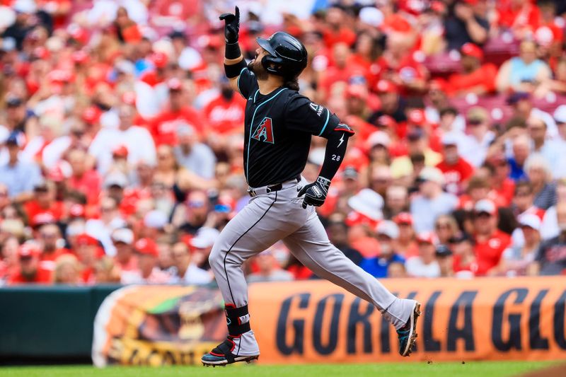 Jun 7, 2025; Cincinnati, Ohio, USA; Arizona Diamondbacks third baseman Eugenio Suarez (28) reacts after hitting a solo home run in the second inning against the Cincinnati Reds at Great American Ball Park. Mandatory Credit: Katie Stratman-Imagn Images
