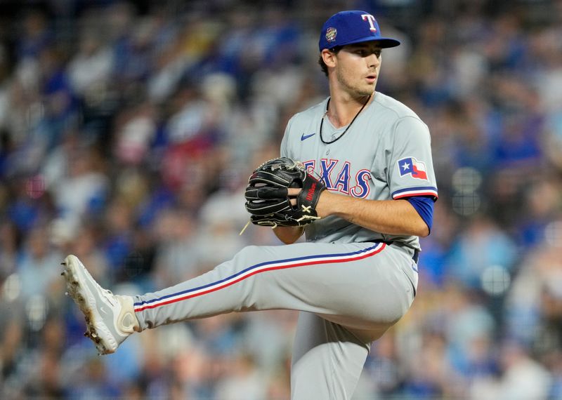 May 3, 2024; Kansas City, Missouri, USA; Texas Rangers pitcher Cole Winn (60) pitches during the seventh inning against the Kansas City Royals at Kauffman Stadium. Mandatory Credit: Jay Biggerstaff-USA TODAY Sports