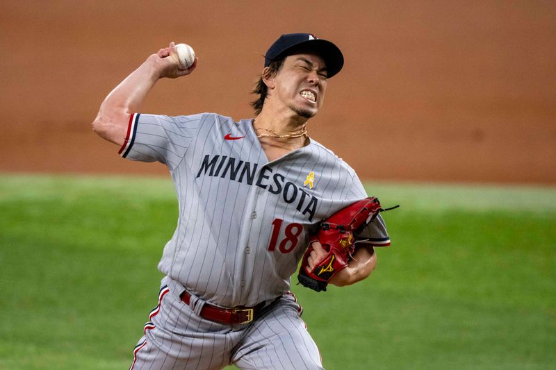 Sep 3, 2023; Arlington, Texas, USA; Minnesota Twins starting pitcher Kenta Maeda (18) pitches against the Texas Rangers during the first inning at Globe Life Field. Mandatory Credit: Jerome Miron-USA TODAY Sports