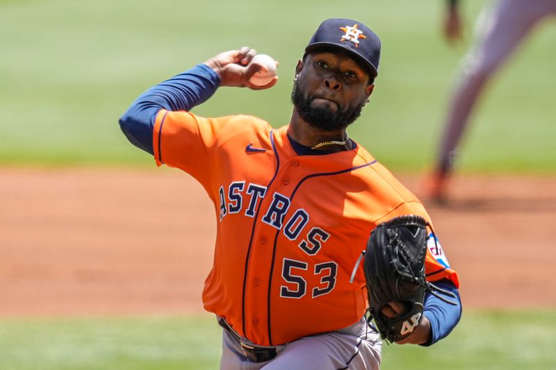 Apr 23, 2023; Cumberland, Georgia, USA; Houston Astros starting pitcher Cristian Javier (53) pitches against the Atlanta Braves during the first inning at Truist Park. Mandatory Credit: Dale Zanine-USA TODAY Sports