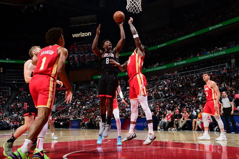 ATLANTA, GA - FEBRUARY 10: Jae'Sean Tate #8 of the Houston Rockets drives to the basket during the game against the Atlanta Hawks on February 10, 2024 at State Farm Arena in Atlanta, Georgia.  NOTE TO USER: User expressly acknowledges and agrees that, by downloading and/or using this Photograph, user is consenting to the terms and conditions of the Getty Images License Agreement. Mandatory Copyright Notice: Copyright 2024 NBAE (Photo by Scott Cunningham/NBAE via Getty Images)