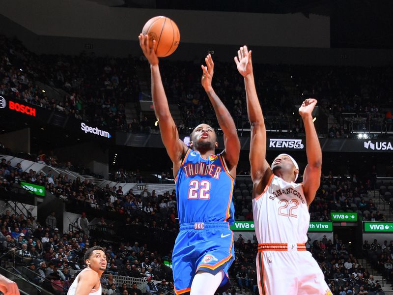 SAN ANTONIO, TX - JANUARY 24: Cason Wallace #22 of the Oklahoma City Thunder drives to the basket during the game against the San Antonio Spurs on January 24, 2024 at the Frost Bank Center in San Antonio, Texas. NOTE TO USER: User expressly acknowledges and agrees that, by downloading and or using this photograph, user is consenting to the terms and conditions of the Getty Images License Agreement. Mandatory Copyright Notice: Copyright 2024 NBAE (Photos by Michael Gonzales/NBAE via Getty Images)