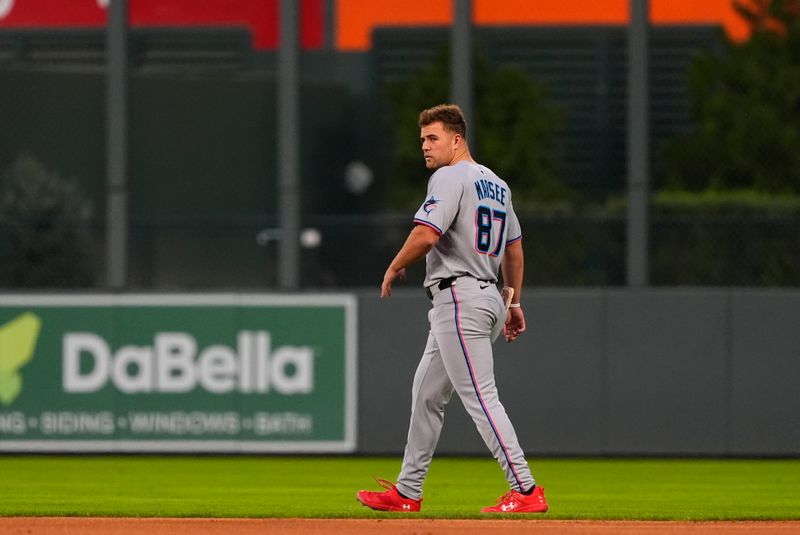 Sep 16, 2025; Denver, Colorado, USA; Miami Marlins center fielder Jakob Marsee (87) walks the infield in the first inning against the Colorado Rockies at Coors Field. Mandatory Credit: Ron Chenoy-Imagn Images