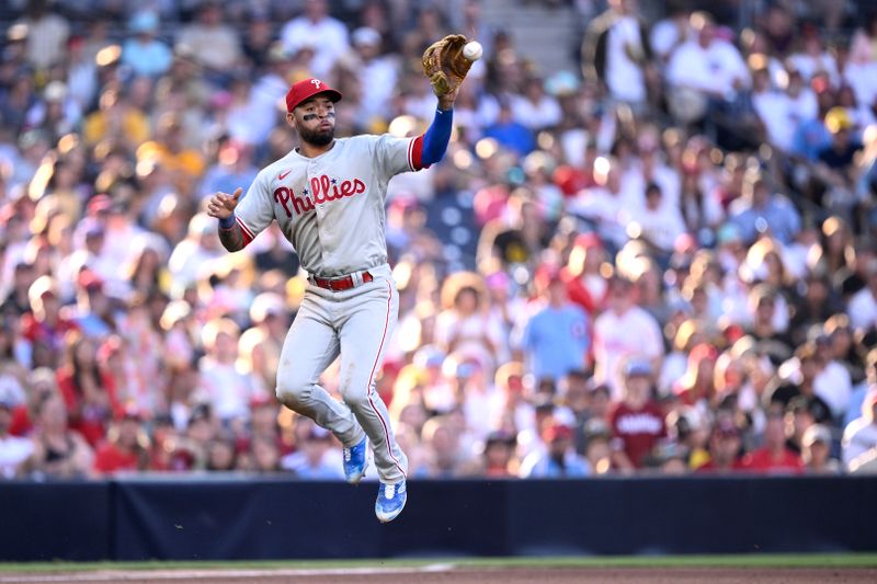 Sep 4, 2023; San Diego, California, USA; Philadelphia Phillies third baseman Edmundo Sosa (33) catches a throw to third base during the sixth inning against the San Diego Padres at Petco Park. Mandatory Credit: Orlando Ramirez-USA TODAY Sports