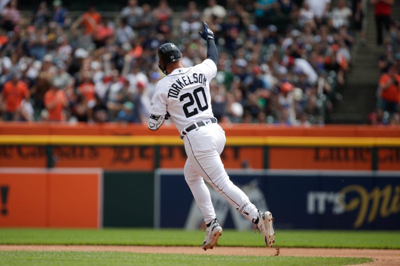 Jul 23, 2023; Detroit, Michigan, USA; Detroit Tigers infielder Spencer Torkelson (20) hits a home run during the first inning of the game against the San Diego Padres at Comerica Park. Mandatory Credit: Brian Bradshaw Sevald-USA TODAY Sports