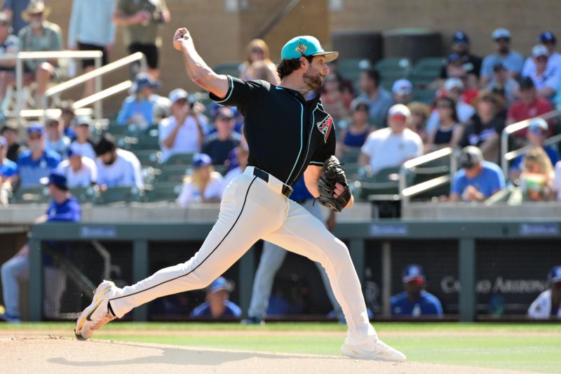 Feb 25, 2026; Salt River Pima-Maricopa, Arizona, USA; Arizona Diamondbacks pitcher Zac Gallen (23) throws in the first inning against the Los Angeles Dodgers at Salt River Fields at Talking Stick. Mandatory Credit: Matt Kartozian-Imagn Images