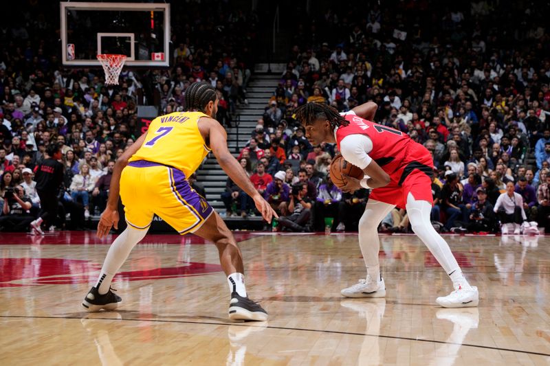 TORONTO, CANADA - NOVEMBER 1: Ja'Kobe Walter #14 of the Toronto Raptors handles the ball during the game against the Los Angeles Lakers on November 1, 2024 at the Scotiabank Arena in Toronto, Ontario, Canada.  NOTE TO USER: User expressly acknowledges and agrees that, by downloading and or using this Photograph, user is consenting to the terms and conditions of the Getty Images License Agreement.  Mandatory Copyright Notice: Copyright 2024 NBAE (Photo by Mark Blinch/NBAE via Getty Images)