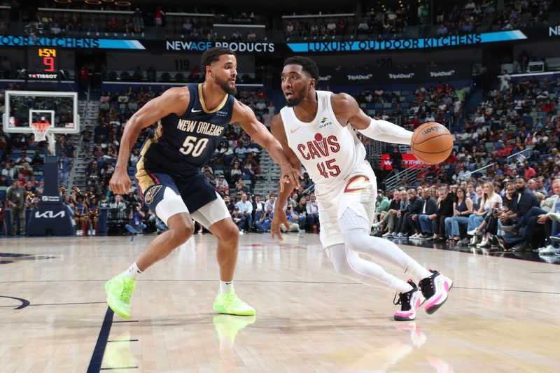 NEW ORLEANS, LA - NOVEMBER 6: Donovan Mitchell #45 of the Cleveland Cavaliers drives to the basket during the game against the New Orleans Pelicans on November 6, 2024 at the Smoothie King Center in New Orleans, Louisiana. NOTE TO USER: User expressly acknowledges and agrees that, by downloading and or using this Photograph, user is consenting to the terms and conditions of the Getty Images License Agreement. Mandatory Copyright Notice: Copyright 2024 NBAE (Photo by Layne Murdoch Jr./NBAE via Getty Images)