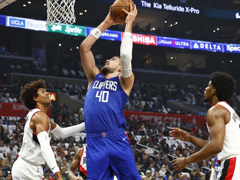 LOS ANGELES, CALIFORNIA - OCTOBER 25:  Ivica Zubac #40 of the LA Clippers takes a shot against the Portland Trail Blazers in the first half at Crypto.com Arena on October 25, 2023 in Los Angeles, California.  NOTE TO USER: User expressly acknowledges and agrees that, by downloading and/or using this photograph, user is consenting to the terms and conditions of the Getty Images License Agreement. (Photo by Ronald Martinez/Getty Images)