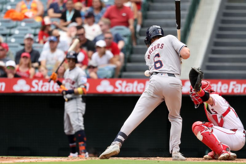 Sep 15, 2024; Anaheim, California, USA;  Houston Astros center fielder Jake Meyers (6) is hit by a pitch during the third inning against the Los Angeles Angels at Angel Stadium. Mandatory Credit: Kiyoshi Mio-Imagn Images