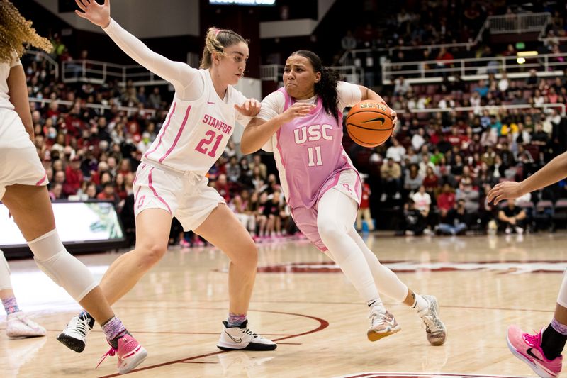 Feb 17, 2023; Stanford, California, USA;  USC Trojans guard Destiny Littleton (11) drives past Stanford Cardinal forward Brooke Demetre (21) during the first half at Maples Pavilion. Mandatory Credit: John Hefti-USA TODAY Sports