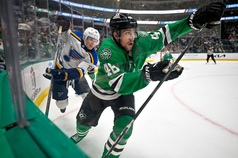 Dec 14, 2024; Dallas, Texas, USA; St. Louis Blues left wing Dylan Holloway (81) and Dallas Stars defenseman Ilya Lyubushkin (46) chase the puck during the first period at American Airlines Center. Mandatory Credit: Jerome Miron-Imagn Images