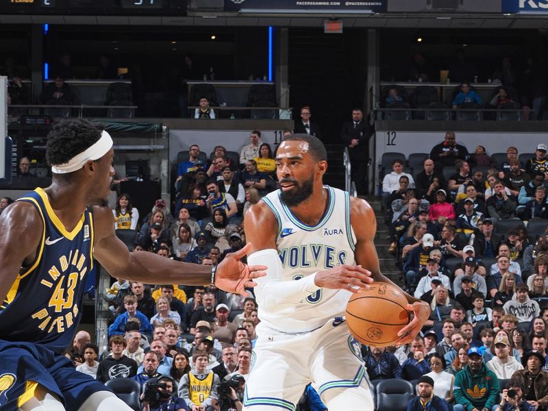 INDIANAPOLIS, IN - MARCH 7: Mike Conley #10 of the Minnesota Timberwolves dribbles the ball during the game against the Indiana Pacers on March 7, 2024 at Gainbridge Fieldhouse in Indianapolis, Indiana. NOTE TO USER: User expressly acknowledges and agrees that, by downloading and or using this Photograph, user is consenting to the terms and conditions of the Getty Images License Agreement. Mandatory Copyright Notice: Copyright 2024 NBAE (Photo by Ron Hoskins/NBAE via Getty Images)