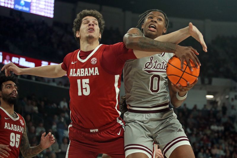 Jan 13, 2026; Starkville, Mississippi, USA; Alabama Crimson Tide center Noah Williamson (15) and Mississippi State Bulldogs forward Jamarion Davis-Fleming (0) battle for a rebound during the first half at Humphrey Coliseum. Mandatory Credit: Petre Thomas-Imagn Images