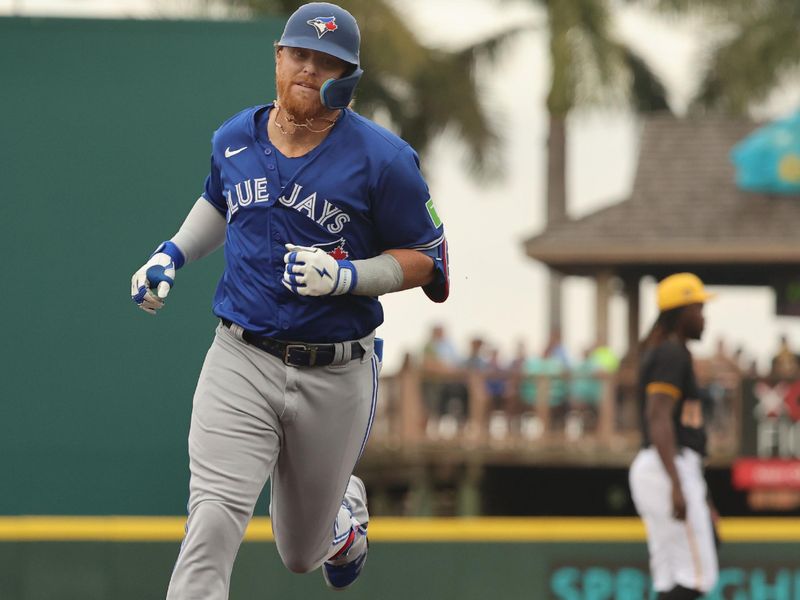 Mar 21, 2024; Bradenton, Florida, USA; Toronto Blue Jays third baseman Justin Turner (2)  runs arounds the bases after he hit a 2-run home run during the first inning against the Pittsburgh Pirates at LECOM Park. Mandatory Credit: Kim Klement Neitzel-USA TODAY Sports