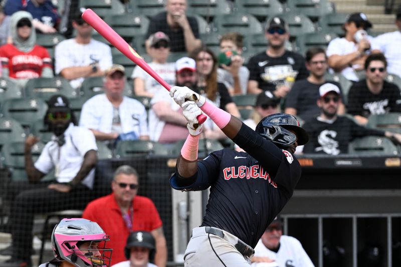 May 12, 2024; Chicago, Illinois, USA;  Cleveland Guardians outfielder Estevan Florial (90) hits an RBI double against the Chicago White Sox during the sixth inning at Guaranteed Rate Field. Mandatory Credit: Matt Marton-USA TODAY Sports