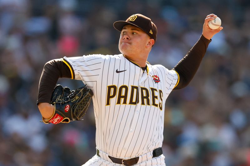 May 27, 2024; San Diego, California, USA;  San Diego Padres relief pitcher Adrian Morejon (50) throws a pitch during the sixth inning against the Miami Marlins at Petco Park. Mandatory Credit: David Frerker-USA TODAY Sports