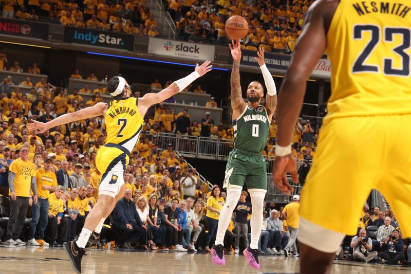 INDIANAPOLIS, IN - APRIL 26: Damian Lillard #0 of the Milwaukee Bucks shoots the ball during the gameagainst the Indiana Pacers during Round 1 Game 3 of the 2024 NBA Playoffs on April 26, 2024 at Gainbridge Fieldhouse in Indianapolis, Indiana. NOTE TO USER: User expressly acknowledges and agrees that, by downloading and or using this Photograph, user is consenting to the terms and conditions of the Getty Images License Agreement. Mandatory Copyright Notice: Copyright 2023 NBAE (Photo by Nathaniel S. Butler/NBAE via Getty Images)