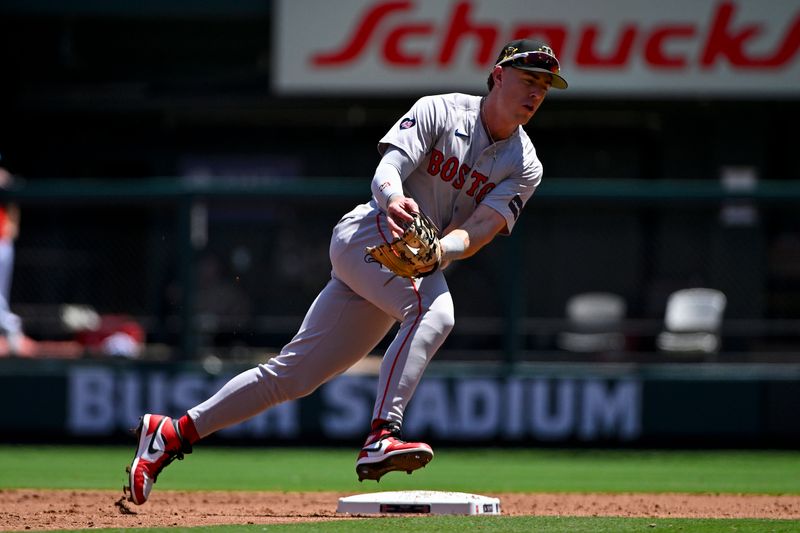 May 19, 2024; St. Louis, Missouri, USA;  Boston Red Sox shortstop Romy Gonzalez (23) fields a ground ball against the St. Louis Cardinals during the second inning at Busch Stadium. Mandatory Credit: Jeff Curry-USA TODAY Sports