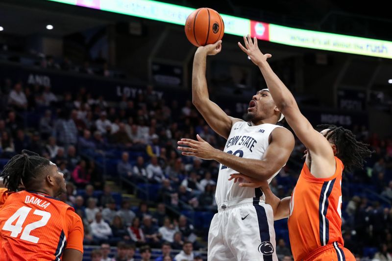 Feb 14, 2023; University Park, Pennsylvania, USA; Penn State Nittany Lions guard Jalen Pickett (22) drives the ball to the basket during the first half against the Illinois Fighting Illini at Bryce Jordan Center. Penn State defeated Illinois 93-81. Mandatory Credit: Matthew OHaren-USA TODAY Sports