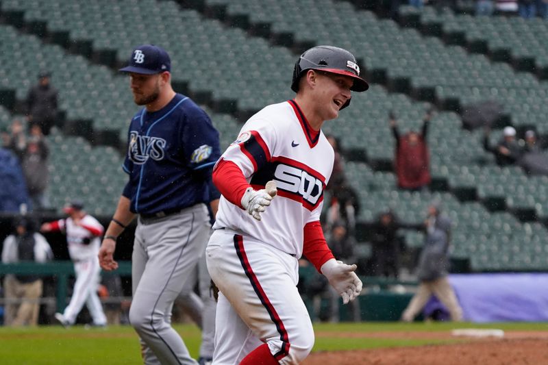 Apr 30, 2023; Chicago, Illinois, USA; Chicago White Sox first baseman Andrew Vaughn (25) runs the bases after hitting a game-winning three-run home run against the Tampa Bay Rays during the ninth inning at Guaranteed Rate Field. Mandatory Credit: David Banks-USA TODAY Sports