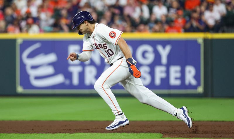 May 1, 2024; Houston, Texas, USA;  Houston Astros left fielder Joey Loperfido (10) runs to second base during the third inning against the Cleveland Guardians at Minute Maid Park. Mandatory Credit: Troy Taormina-USA TODAY Sports