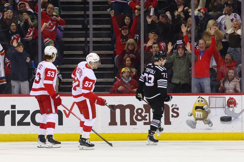 Dec 23, 2023; Newark, New Jersey, USA; New Jersey Devils right wing Tyler Toffoli (73) celebrates his goal against the Detroit Red Wings during the third period at Prudential Center. Mandatory Credit: Ed Mulholland-USA TODAY Sports