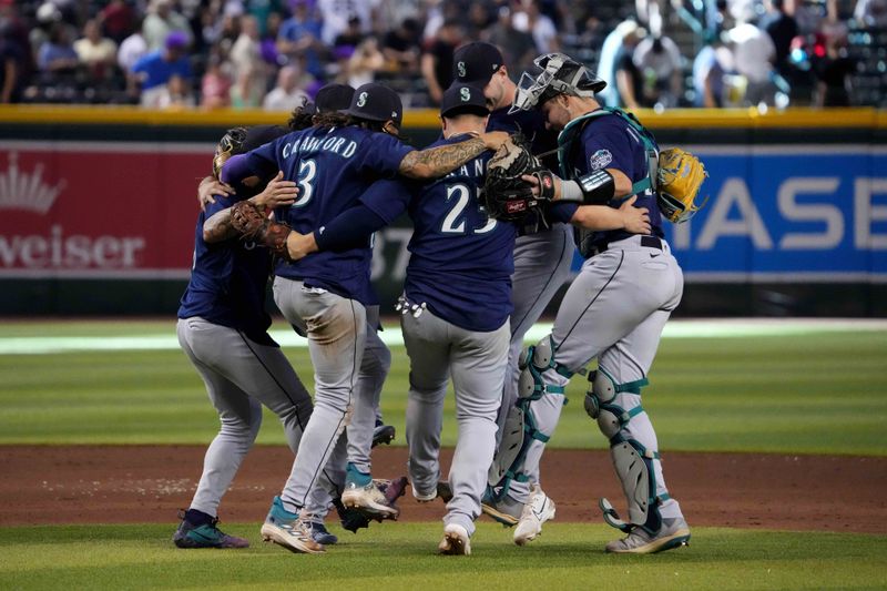 Jul 30, 2023; Phoenix, Arizona, USA; Seattle Mariners players celebrate after defeating the Arizona Diamondbacks  at Chase Field. Mandatory Credit: Joe Camporeale-USA TODAY Sports