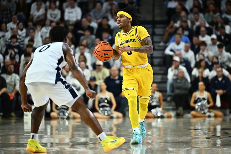 Jan 7, 2024; Philadelphia, Pennsylvania, USA; Michigan Wolverines guard Dug McDaniel (0) controls the ball against the Penn State Nittany Lions in the second half at The Palestra. Mandatory Credit: Kyle Ross-USA TODAY Sports