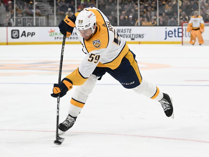 Oct 14, 2023; Boston, Massachusetts, USA; Nashville Predators defenseman Roman Josi (59) takes a shot against the Boston Bruins during the third period at the TD Garden. Mandatory Credit: Brian Fluharty-USA TODAY Sports