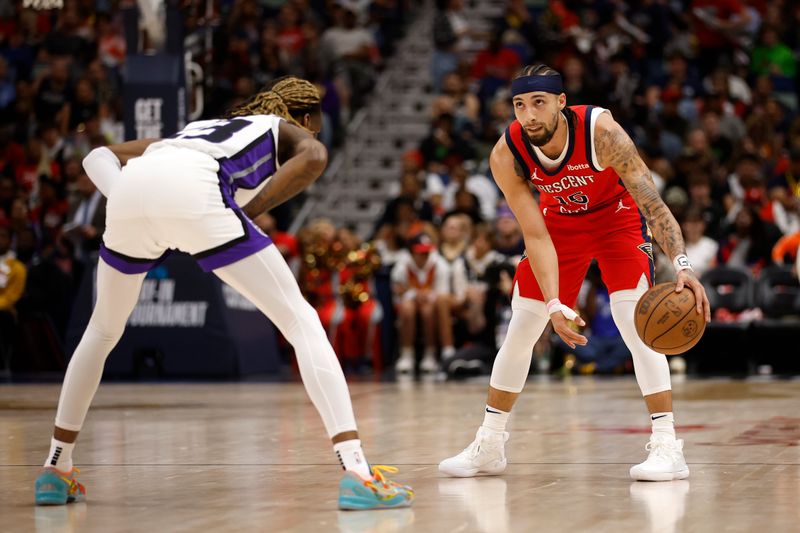 NEW ORLEANS, LOUISIANA - APRIL 19: Jose Alvarado #15 of the New Orleans Pelicans drives the ball up the court against the Sacramento Kings at Smoothie King Center on April 19, 2024 in New Orleans, Louisiana. NOTE TO USER: User expressly acknowledges and agrees that, by downloading and or using this photograph, User is consenting to the terms and conditions of the Getty Images License Agreement.  (Photo by Chris Graythen/Getty Images)