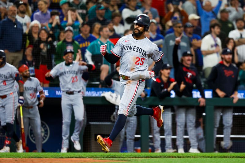May 30, 2025; Seattle, Washington, USA; Minnesota Twins center fielder Byron Buxton (25) scores a game-tying run against the Seattle Mariners during the ninth inning at T-Mobile Park. Mandatory Credit: Joe Nicholson-Imagn Images