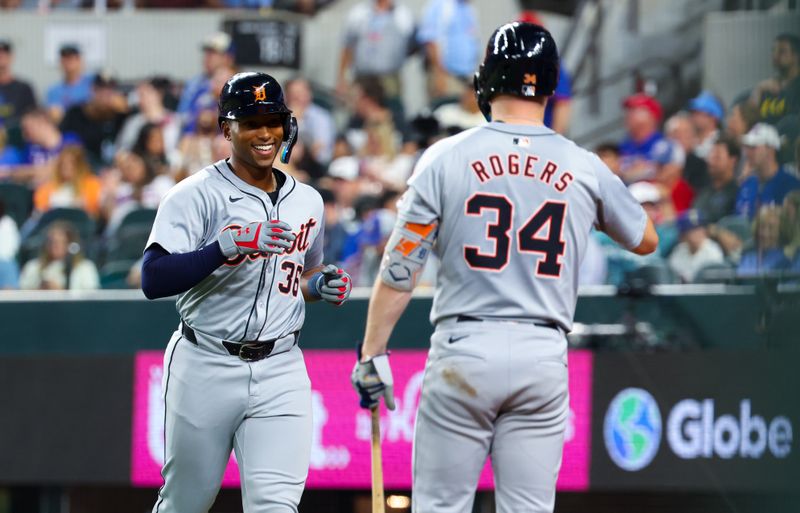 Jun 5, 2024; Arlington, Texas, USA;  Detroit Tigers designated hitter Justyn-Henry Malloy (36) celebrates with Detroit Tigers catcher Jake Rogers (34) after hitting a home run during the sixth inning against the Texas Rangers at Globe Life Field. Mandatory Credit: Kevin Jairaj-USA TODAY Sports