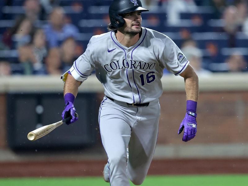May 30, 2025; New York City, New York, USA; Colorado Rockies pinch hitter Sam Hilliard (16) watches his solo home run against the New York Mets during the seventh inning at Citi Field. Mandatory Credit: Brad Penner-Imagn Images
