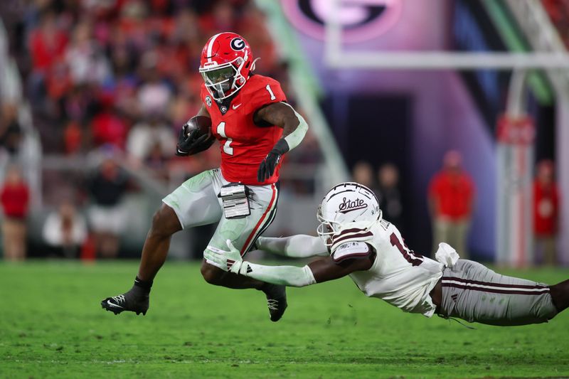 Oct 12, 2024; Athens, Georgia, USA; Georgia Bulldogs running back Trevor Etienne (1) runs the ball against the Mississippi State Bulldogs in the fourth quarter at Sanford Stadium. Mandatory Credit: Brett Davis-Imagn Images
