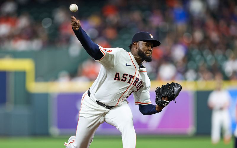 May 16, 2024; Houston, Texas, USA; Houston Astros starting pitcher Cristian Javier (53) delivers a pitch during the fourth inning against the Oakland Athletics at Minute Maid Park. Mandatory Credit: Troy Taormina-USA TODAY Sports