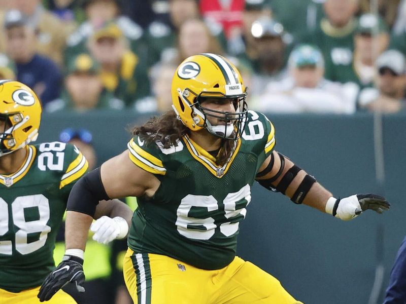 Green Bay Packers offensive tackle David Bakhtiari (69) protects during an NFL football game against the New England Patriots Sunday, Oct. 2, 2022, in Green Bay, Wis. (AP Photo/Jeffrey Phelps)