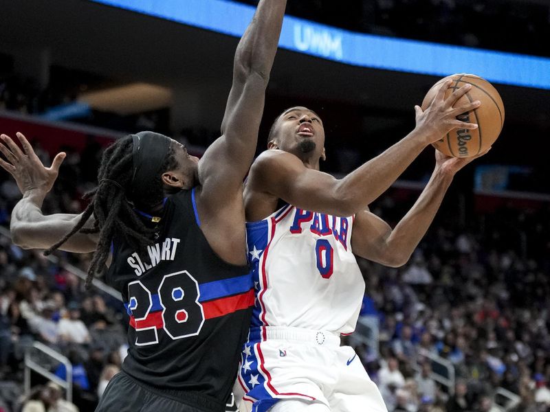 DETROIT, MICHIGAN - NOVEMBER 30: Tyrese Maxey #0 of the Philadelphia 76ers shoots the ball against Isaiah Stewart #28 of the Detroit Pistons during the second quarter at Little Caesars Arena on November 30, 2024 in Detroit, Michigan. NOTE TO USER: User expressly acknowledges and agrees that, by downloading and or using this photograph, User is consenting to the terms and conditions of the Getty Images License Agreement. (Photo by Nic Antaya/Getty Images)