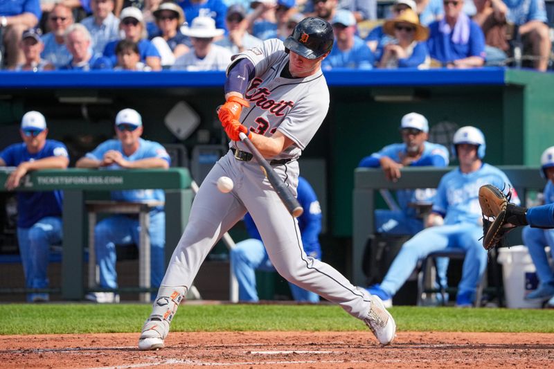 May 31, 2025; Kansas City, Missouri, USA; Detroit Tigers designated hitter Colt Keith (33) hits a single against the Detroit Tigers in the seventh inning at Kauffman Stadium. Mandatory Credit: Denny Medley-Imagn Images