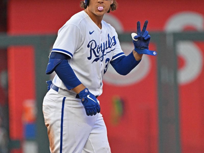 Jun 14, 2023; Kansas City, Missouri, USA;  Kansas City Royals first baseman Nick Pratto (32) reacts after hitting a double in the third inning against the Cincinnati Reds at Kauffman Stadium. Mandatory Credit: Peter Aiken-USA TODAY Sports