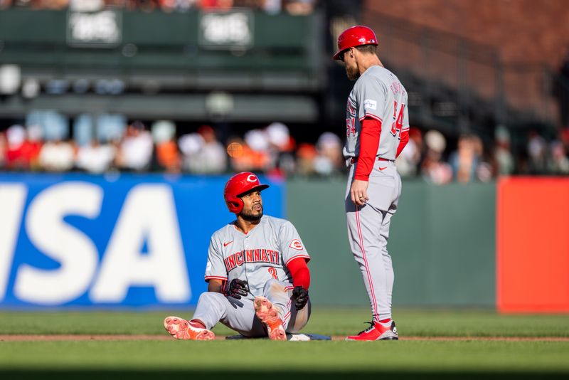 May 11, 2024; San Francisco, California, USA; Cincinnati Reds third baseman Jeimer Candelario (3) sits on the bag after being called out at second base against the San Francisco Giants during the sixth inning at Oracle Park. Mandatory Credit: Bob Kupbens-USA TODAY Sports