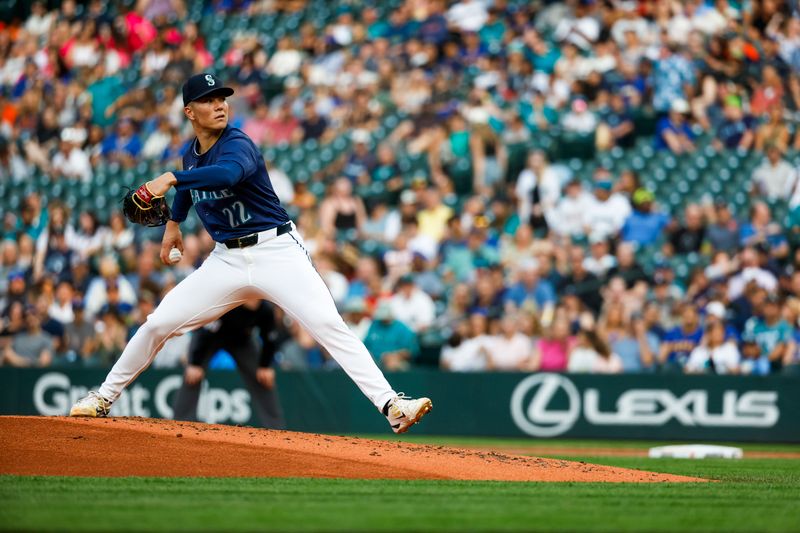 Aug 8, 2024; Seattle, Washington, USA; Seattle Mariners starting pitcher Bryan Woo (22) throws against the Detroit Tigers during the third inning at T-Mobile Park. Mandatory Credit: Joe Nicholson-USA TODAY Sports