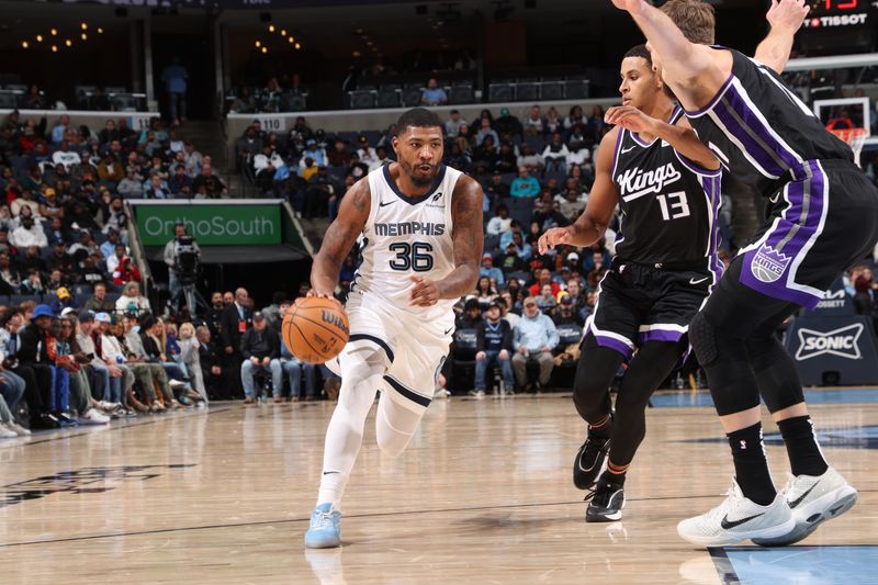 MEMPHIS, TN - DECEMBER 5: Marcus Smart #36 of the Memphis Grizzlies drives to the basket during the game against the Sacramento Kings on December 5, 2024 at FedExForum in Memphis, Tennessee. NOTE TO USER: User expressly acknowledges and agrees that, by downloading and or using this photograph, User is consenting to the terms and conditions of the Getty Images License Agreement. Mandatory Copyright Notice: Copyright 2024 NBAE (Photo by Joe Murphy/NBAE via Getty Images)