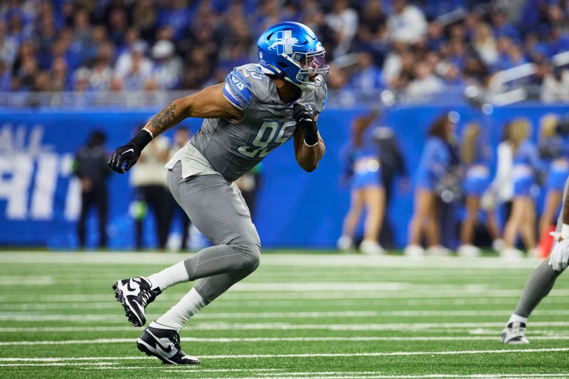 Detroit Lions defensive end Romeo Okwara (95) pursues a play on defense against the Minnesota Vikings during an NFL football game at Ford Field in Detroit, Sunday, Jan. 7, 2024. (AP Photo/Rick Osentoski)