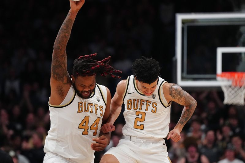 Jan 18, 2024; Boulder, Colorado, USA; Colorado Buffaloes guard KJ Simpson (2) and center Eddie Lampkin Jr. (44) celebrate a three point basket in the first half at the CU Events Center. Mandatory Credit: Ron Chenoy-USA TODAY Sports