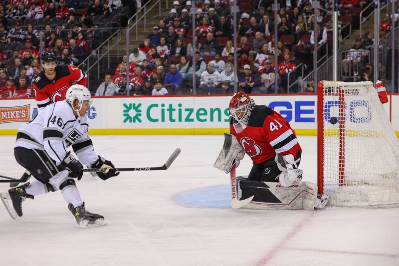 Feb 23, 2023; Newark, New Jersey, USA; Los Angeles Kings center Blake Lizotte (46) hits the post with a shot while New Jersey Devils goaltender Vitek Vanecek (41) defends his net during the first period at Prudential Center. Mandatory Credit: Ed Mulholland-USA TODAY Sports