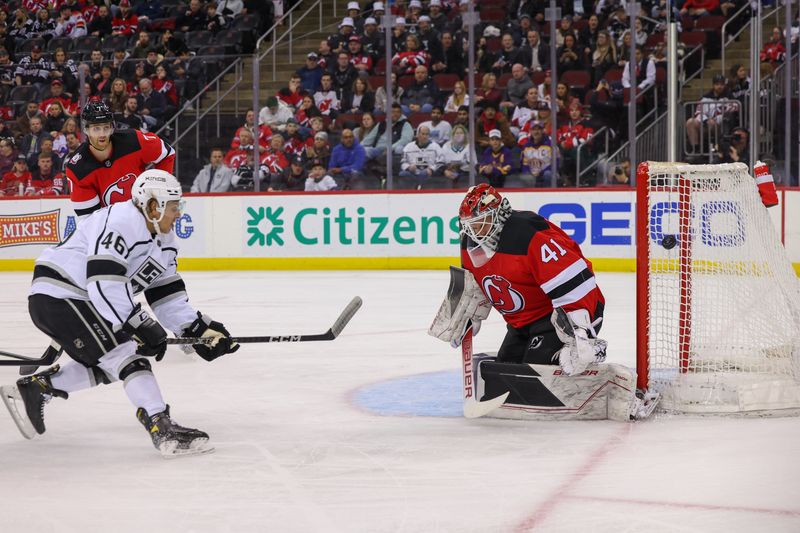 Feb 23, 2023; Newark, New Jersey, USA; Los Angeles Kings center Blake Lizotte (46) hits the post with a shot while New Jersey Devils goaltender Vitek Vanecek (41) defends his net during the first period at Prudential Center. Mandatory Credit: Ed Mulholland-USA TODAY Sports